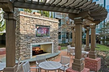 Outdoor fireplace and entertainment area
